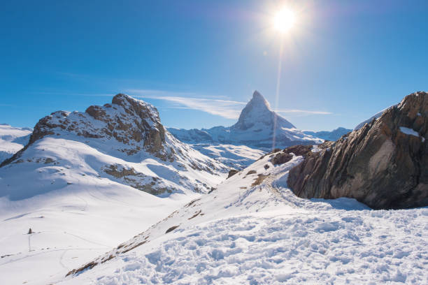 istock Sun behind Matterhorn, Zermatt, Switzerland 692937998