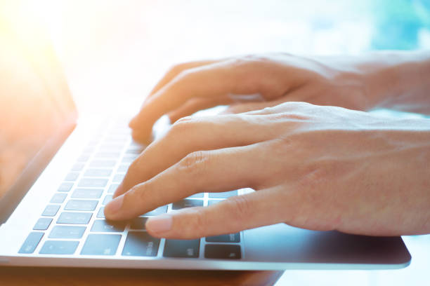 istock Businessman hands typing on laptop 692938056