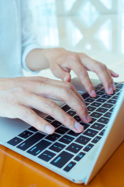 istock Businessman hands typing on laptop 692938246
