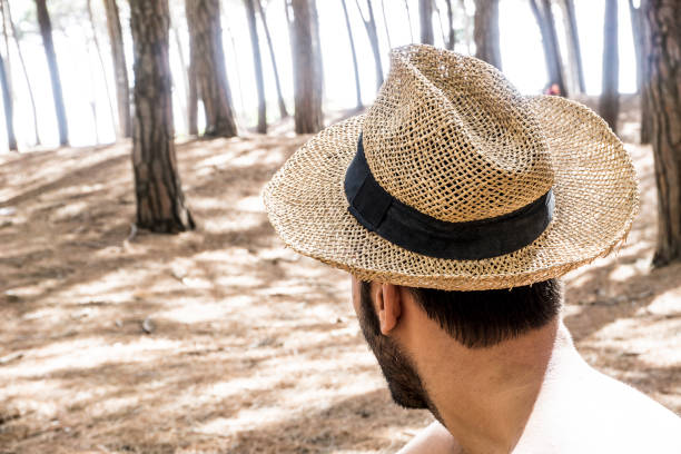 istock Young adult man looking forardin pine forest 692945180