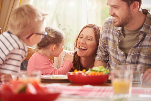 istock family mealtime fun 692951402
