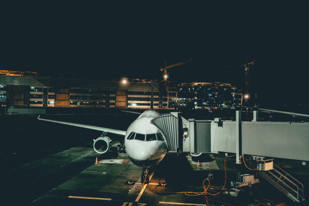 istock Aircraft maintenance at night airport 692954264