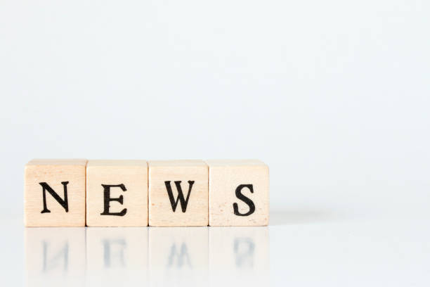 istock wooden cube written as NEWS,made with building blocks 692954680
