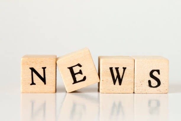 istock wooden cube written as NEWS,made with building blocks 692954810