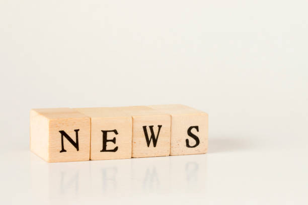 istock wooden cube written as NEWS,made with building blocks 692954970