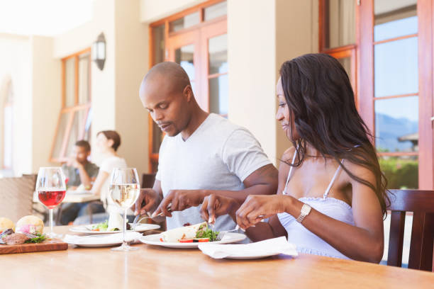 istock African couple having lunch in hotel restaurant 692962438