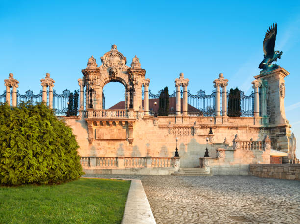 istock Ornate gates into Buda Castle in Budapest at dawn 692962700