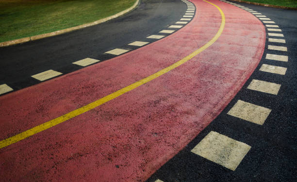 istock Curve of a walking track at night 692965684