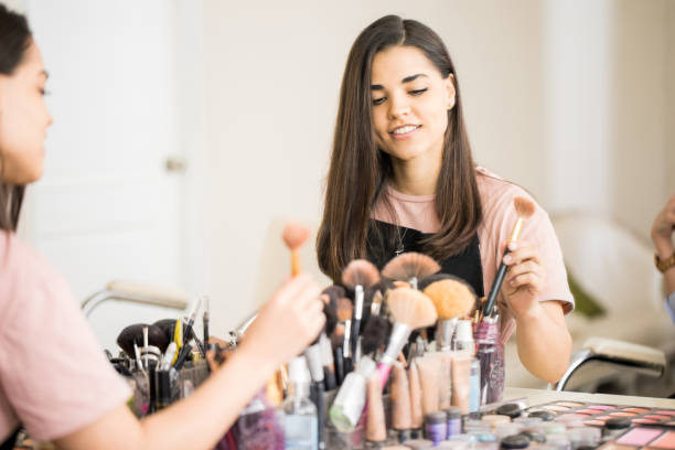 istock Makeup artist choosing a brush 692971584