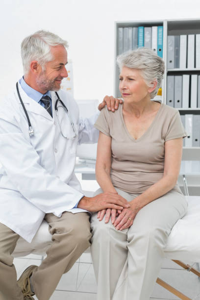 istock Female senior patient visiting a doctor 692972422
