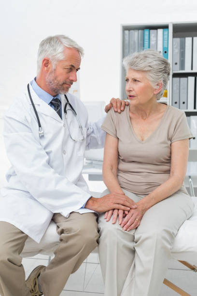 istock Female senior patient visiting a doctor 692972498