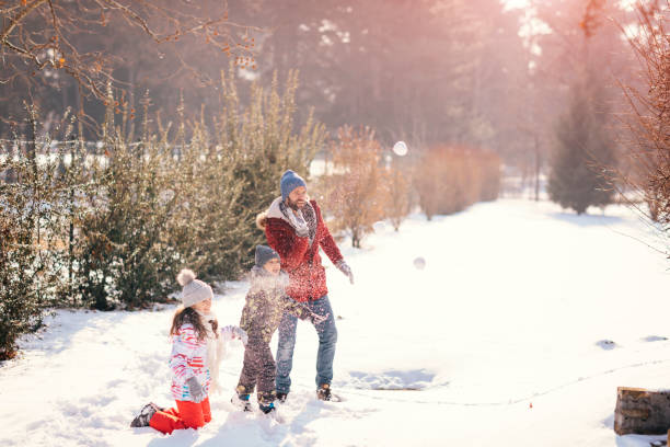 istock Family Having Fun Outdoors At Winter 692972748