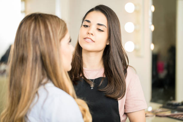 istock Makeup artist at work in a salon 692975828