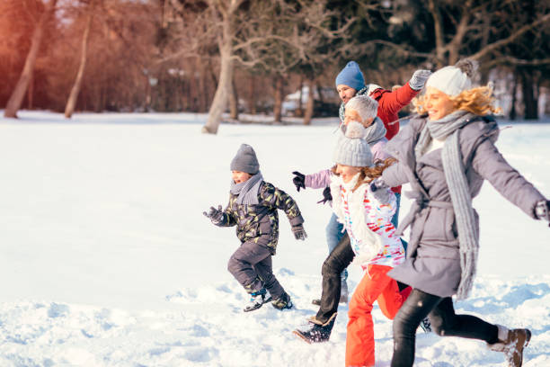 istock Two Generation Family Having Fun Outdoors At Winter 692975836