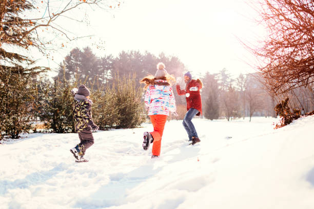 istock Family Having Fun Outdoors At Winter 692976598