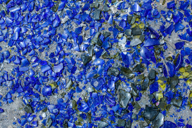 istock many broken pieces of glass in blue 692979104