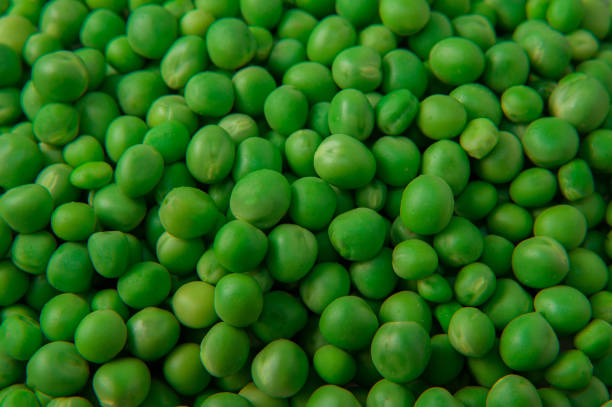Green fresh peas background
