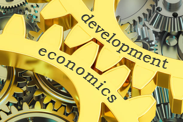 istock Development Economics concept on the gearwheels, 3D rendering 692993110