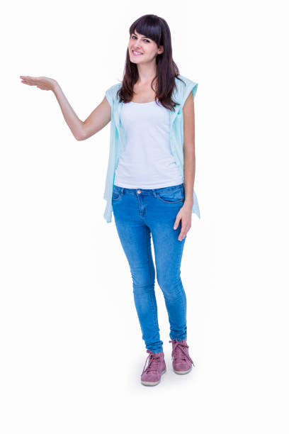 istock Pretty hipster showing something with her hand 692996454