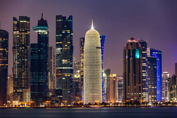 illuminated corniche skyline of doha, qatar