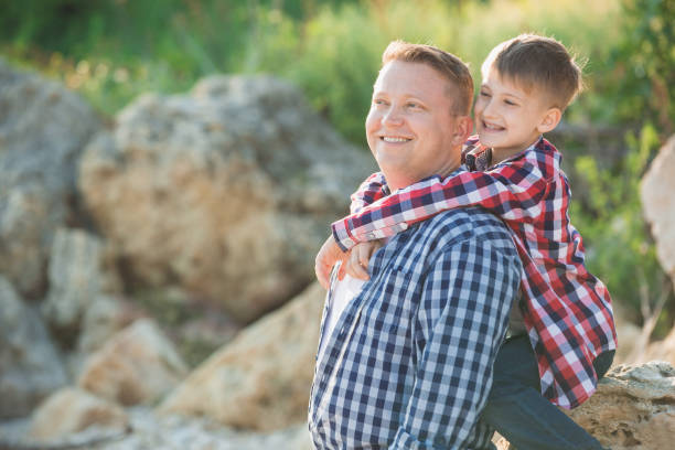 istock Father and son outdoors 693006266