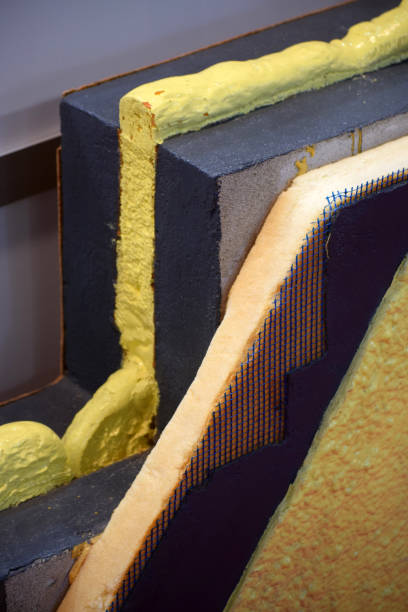 istock Cross-sectional view of the wall panel with insulation made of polyurethane foam 693007630