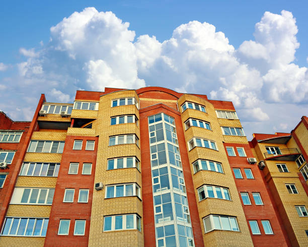 istock New multi-storey building against the blue sky. 693009756