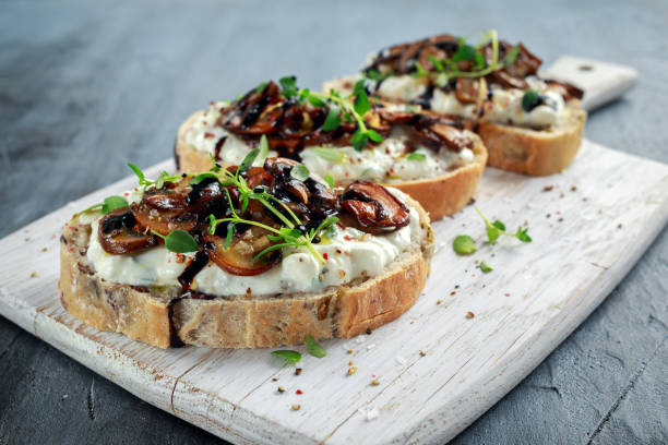 Garlic mushroom toast with creamy herbed ricotta chees spread