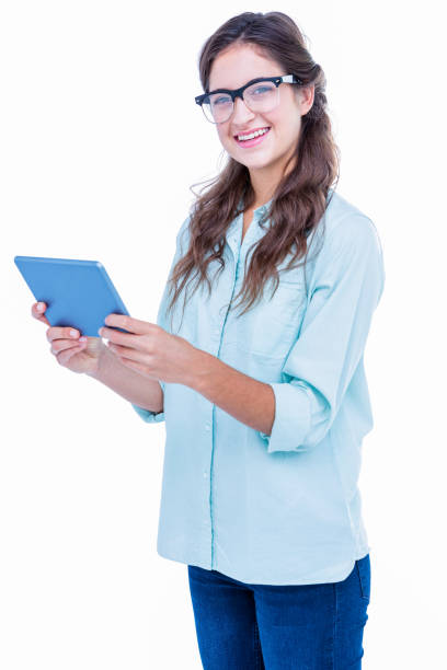 istock Pretty geeky hipster smiling at camera and holding tablet 693013792