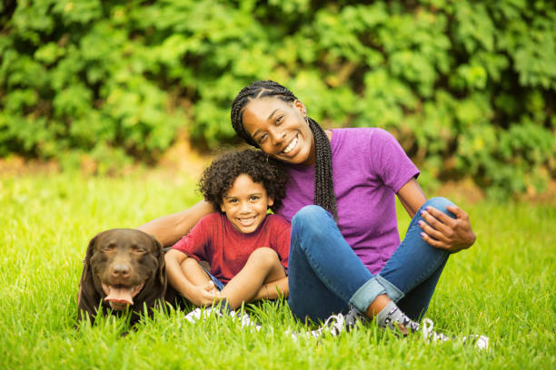 istock Single mother with son and dog 693016936