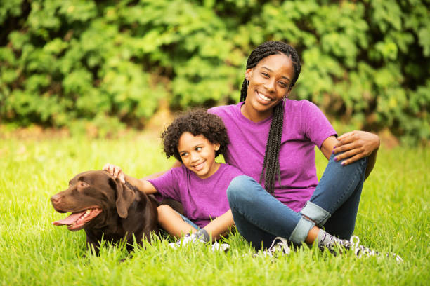 istock Single mother with son and dog 693017320