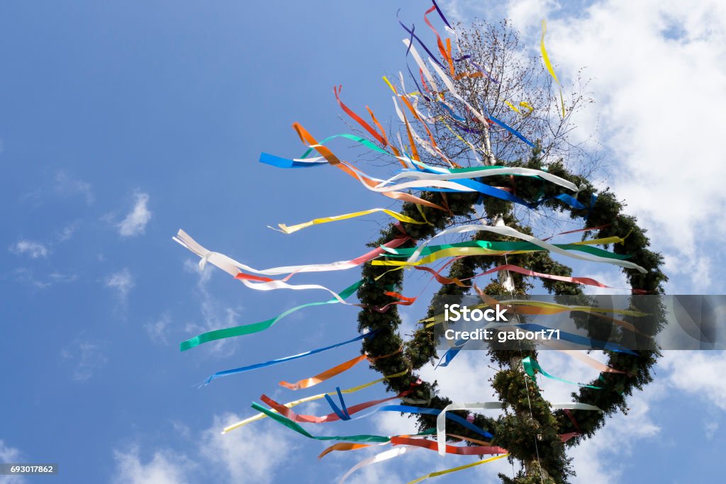 Looking up a Maypole typical maypole in front of sky Maypole Stock Photo