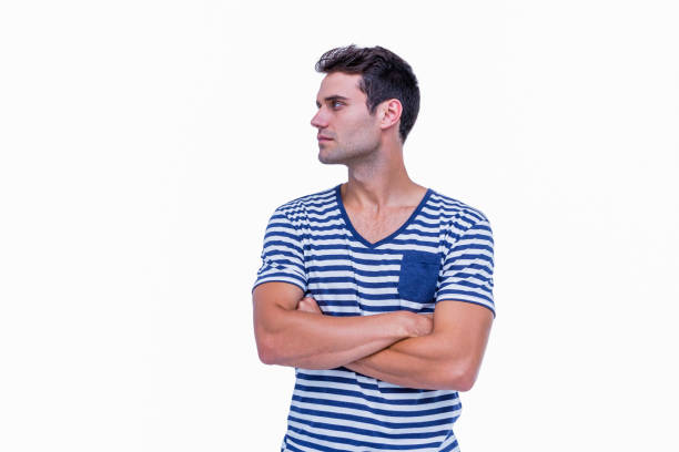 istock Handsome hipster looking away with arms crossed 693031088