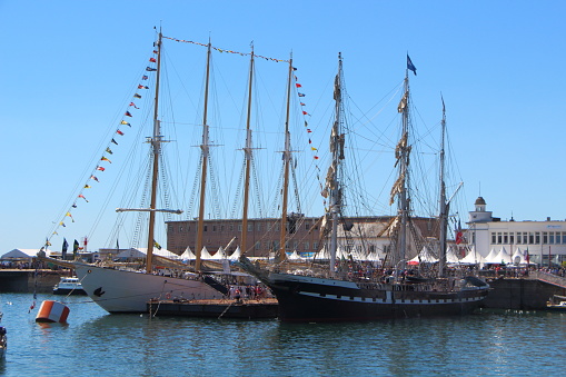 Old sailing ship alongside the quay in Brest harbor during maritime festival