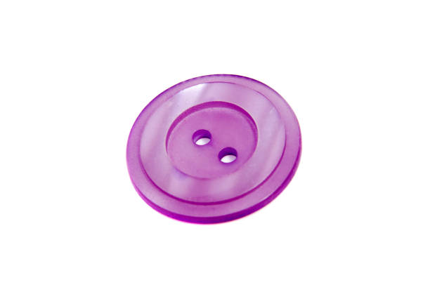 istock Single clothing button isolated over the white background 693034146