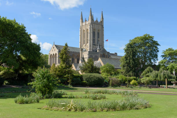 St Edmundsbury Cathedral St Edmundsbury Cathedral with flower borders in foreground bury st edmunds stock pictures, royalty-free photos & images