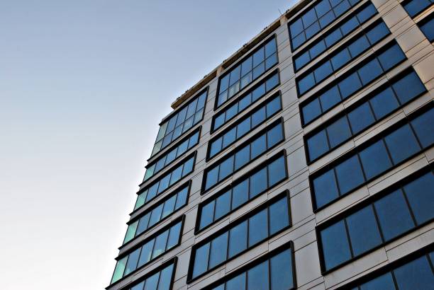 istock Modern building. Modern office building with facade of glass 693037392