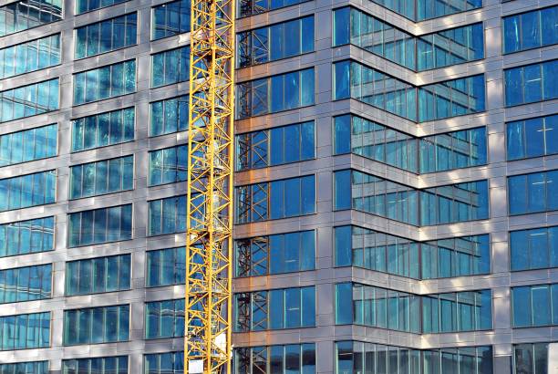 istock Modern building. Modern office building with facade of glass 693040554