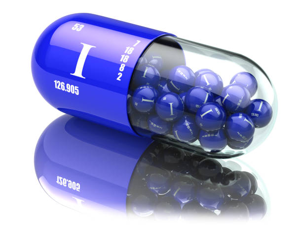 istock Iodine I element pills. Dietary supplements. Vitamin capsules. 693040756