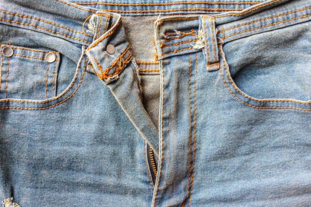 Jeans zipper.Close up jean zipper.Denim texture