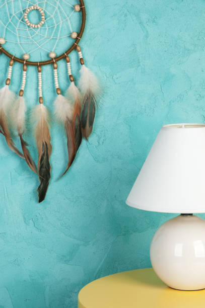 istock Olive dream catcher on aquamarine 693041236