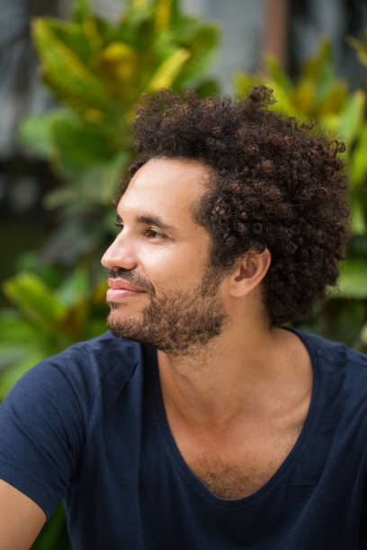 istock Closeup Portrait of Content Young Hispanic Man 693044582