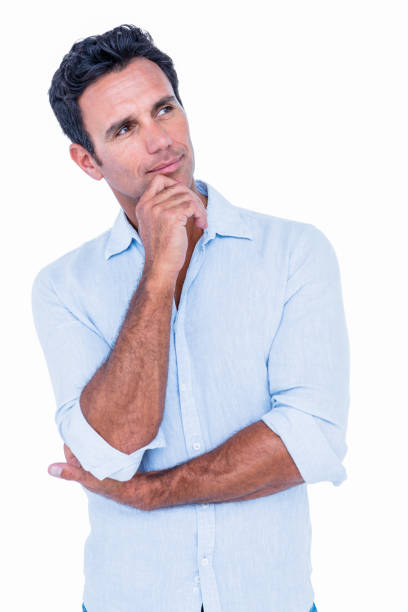 istock Handsome man thinking with finger on chin 693050508