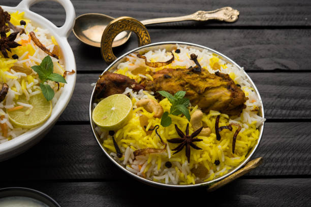 istock kashmiri Mutton Gosht Biryani / Lamb Biryani / Mutton Biryani served with Yogurt dip, selective focus 693051310