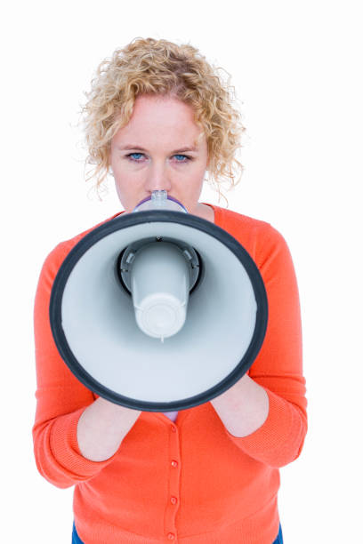 istock Pretty blonde speaking into megaphone 693057584