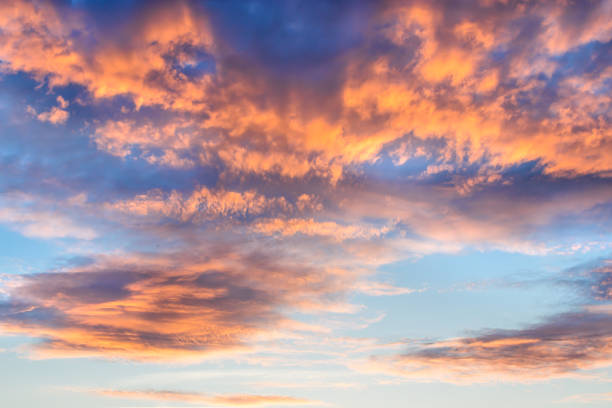 istock Beautiful dramatic sunset sky with colorful clouds 693057642
