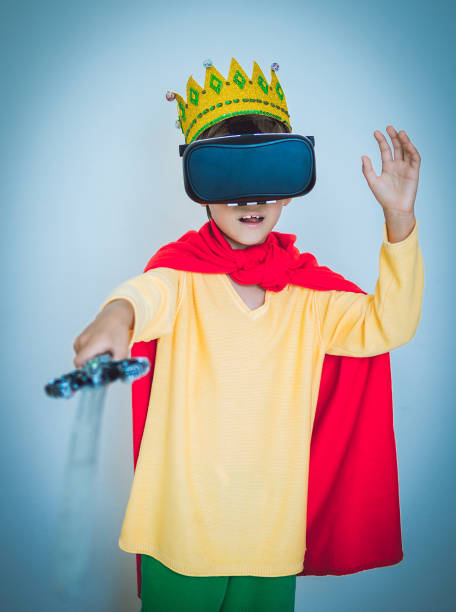istock Young boy play the video game with Virtual Reality 693064126