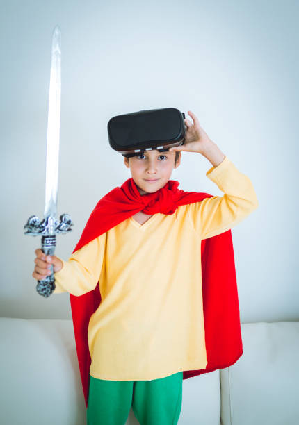 istock Young boy play the video game with Virtual Reality 693064128