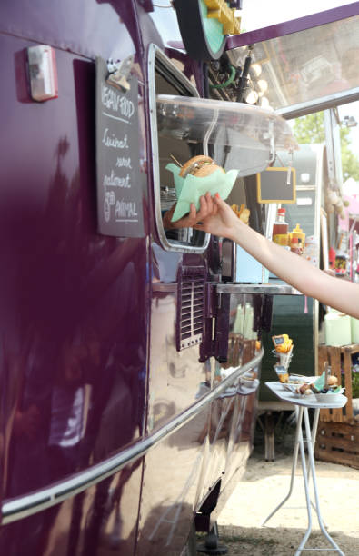 istock Food truck serving 693064134