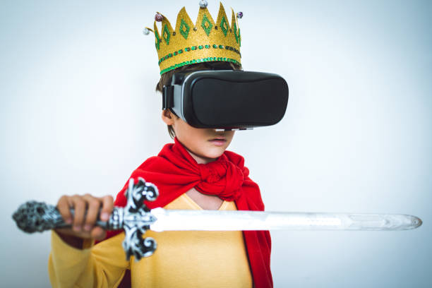 istock Young boy play the video game with Virtual Reality 693064136